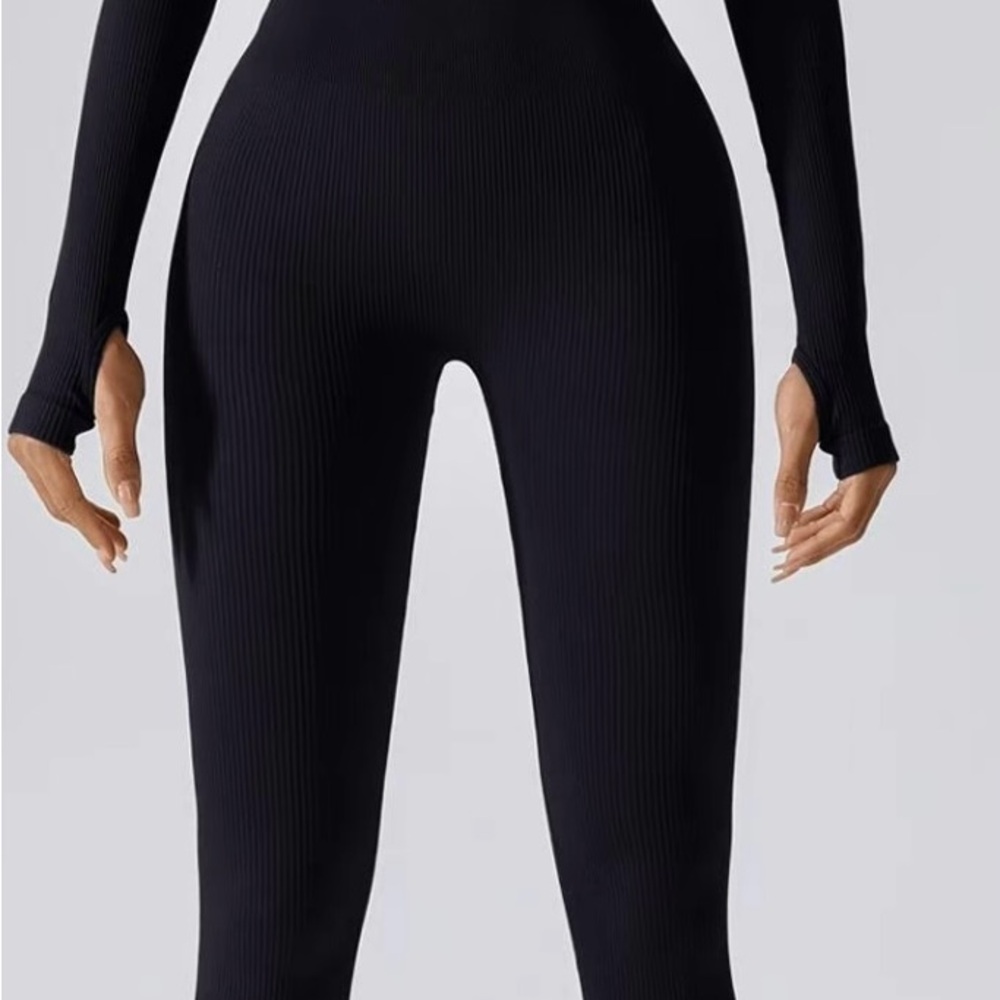 NWOT…. Black Ribbed Jumpsuit